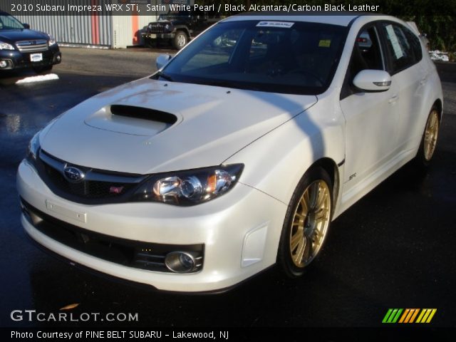 2010 Subaru Impreza WRX STi in Satin White Pearl