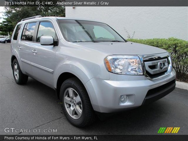 Alabaster silver metallic honda pilot
