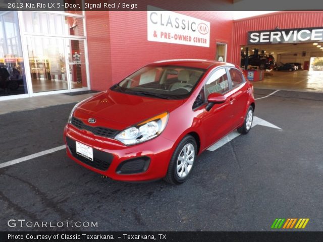 2013 Kia Rio LX 5-Door in Signal Red