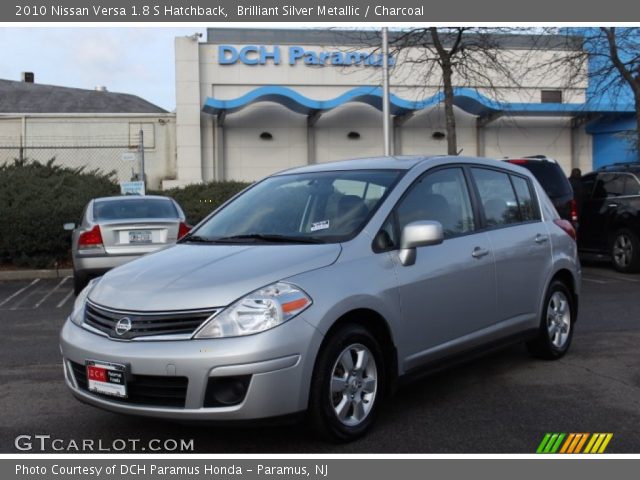 2010 Silver nissan versa hatchback #6