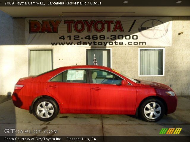 2009 Toyota Camry LE in Barcelona Red Metallic