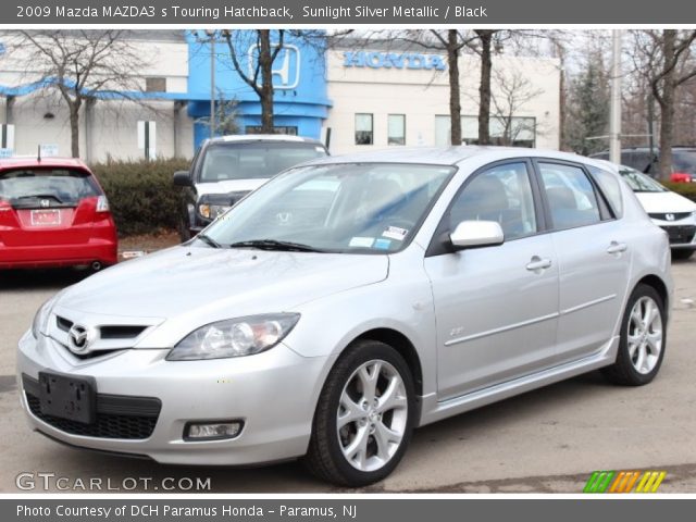 2009 Mazda MAZDA3 s Touring Hatchback in Sunlight Silver Metallic