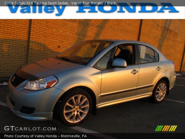 2009 Suzuki SX4 Touring Sport Sedan in Vapor Blue Metallic