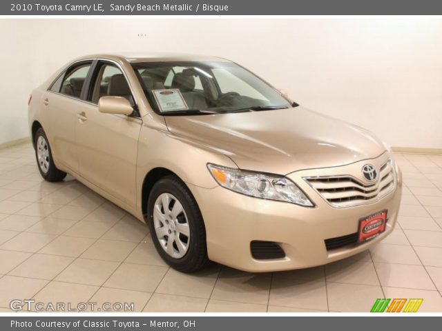 2010 Toyota Camry LE in Sandy Beach Metallic