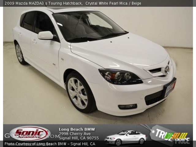 2009 Mazda MAZDA3 s Touring Hatchback in Crystal White Pearl Mica