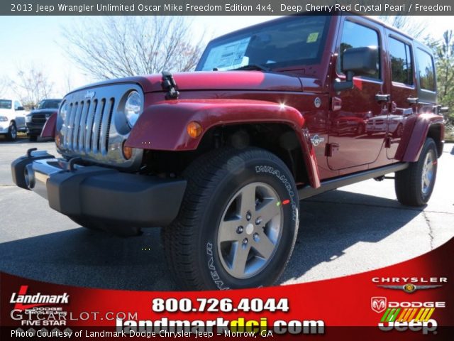2013 Jeep Wrangler Unlimited Oscar Mike Freedom Edition 4x4 in Deep Cherry Red Crystal Pearl