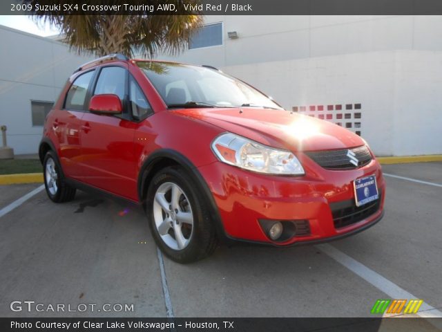 2009 Suzuki SX4 Crossover Touring AWD in Vivid Red