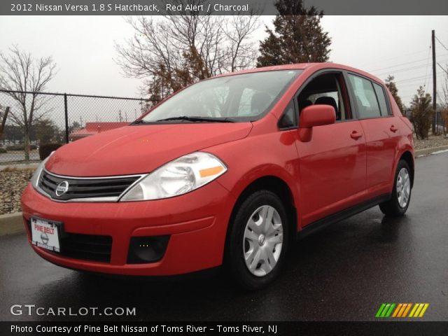 2012 Nissan Versa 1.8 S Hatchback in Red Alert