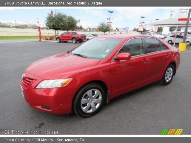 2009 Toyota Camry LE in Barcelona Red Metallic