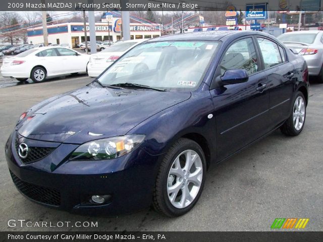 2009 Mazda MAZDA3 i Touring Sedan in Stormy Blue Mica