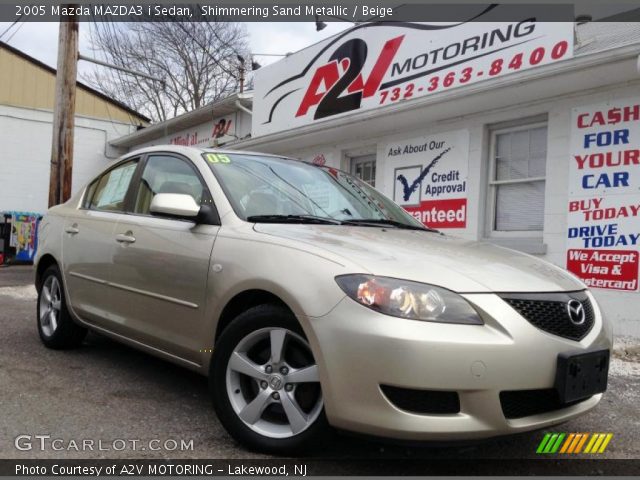 2005 Mazda MAZDA3 i Sedan in Shimmering Sand Metallic
