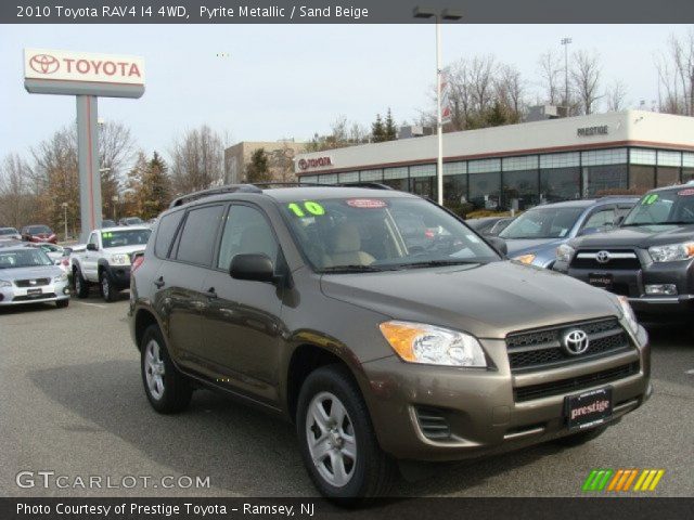 2010 Toyota RAV4 I4 4WD in Pyrite Metallic