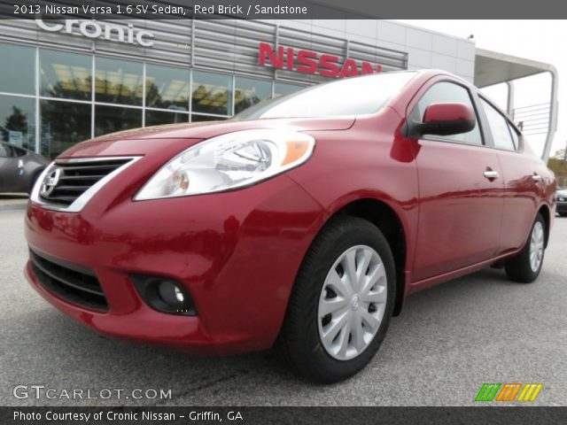 2013 Nissan Versa 1.6 SV Sedan in Red Brick