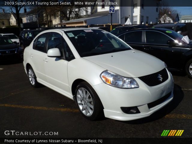2009 Suzuki SX4 Touring Sport Sedan in White Water Pearl