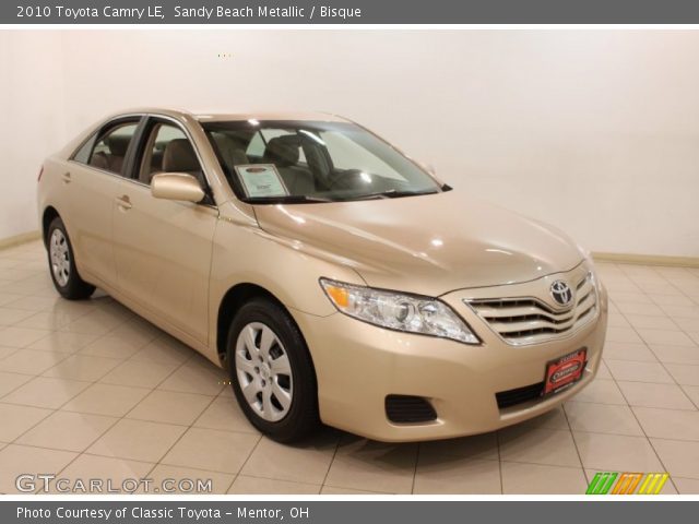 2010 Toyota Camry LE in Sandy Beach Metallic
