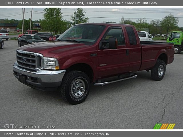 2003 Ford F250 Super Duty XLT SuperCab 4x4 in Toreador Red Metallic