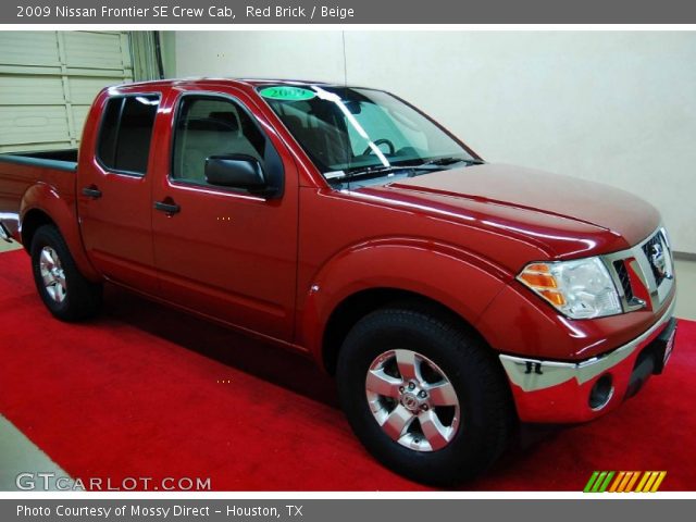 2009 Nissan Frontier SE Crew Cab in Red Brick