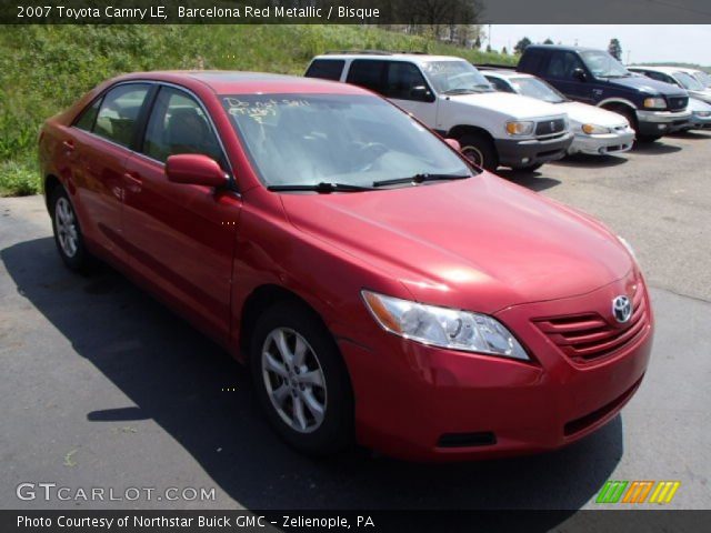 2007 Toyota Camry LE in Barcelona Red Metallic