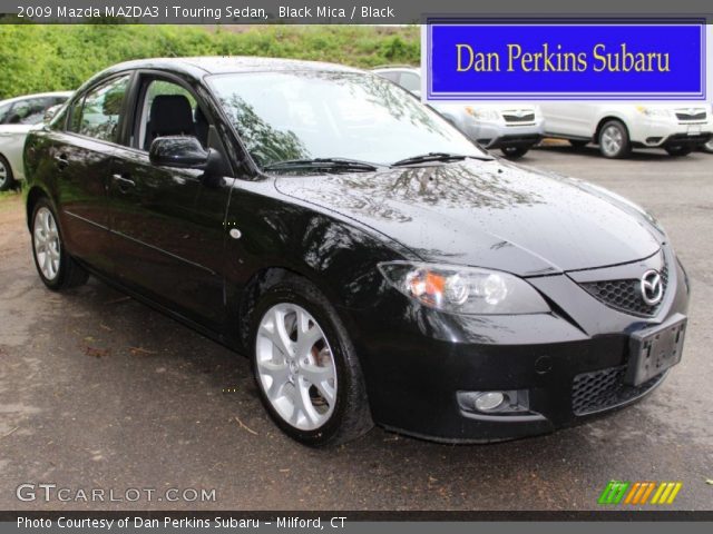 2009 Mazda MAZDA3 i Touring Sedan in Black Mica