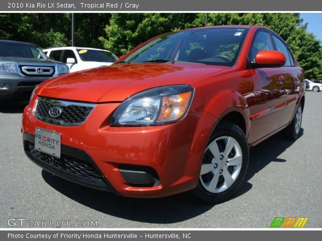 2010 Kia Rio LX Sedan in Tropical Red