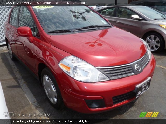 2009 Nissan Versa 1.8 S Sedan in Red Brick