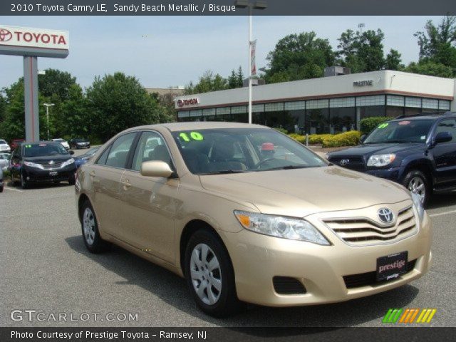 2010 Toyota Camry LE in Sandy Beach Metallic