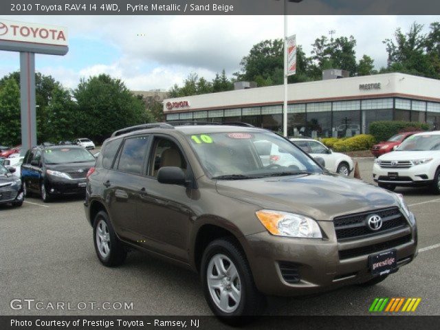 2010 Toyota RAV4 I4 4WD in Pyrite Metallic
