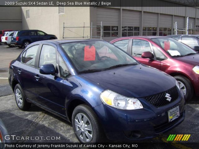2009 Suzuki SX4 Sedan LE in Deep Sea Blue Metallic