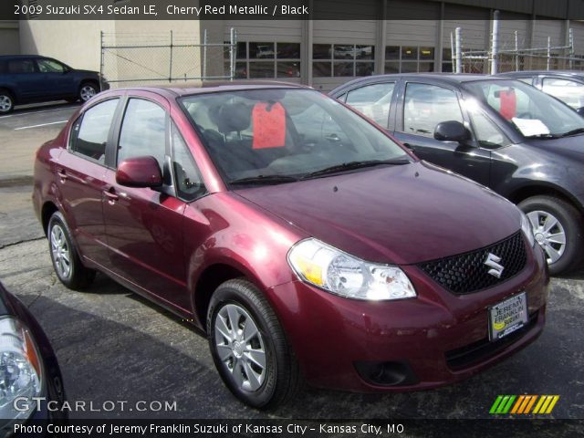 2009 Suzuki SX4 Sedan LE in Cherry Red Metallic