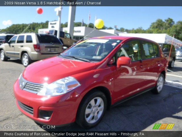 2009 Nissan Versa 1.8 S Hatchback in Red Alert