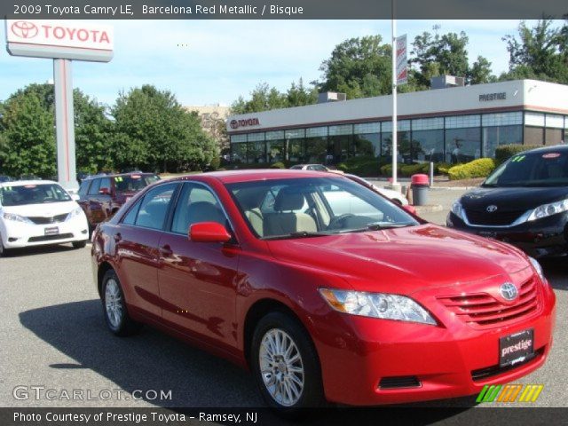 2009 Toyota Camry LE in Barcelona Red Metallic