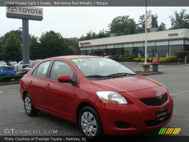 2009 Toyota Yaris S Sedan in Barcelona Red Metallic