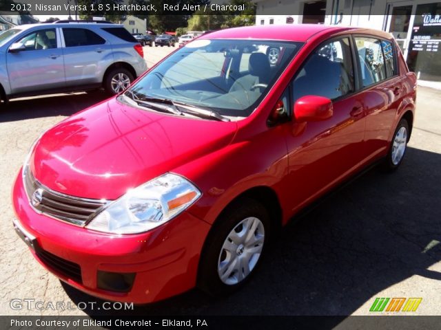 2012 Nissan Versa 1.8 S Hatchback in Red Alert