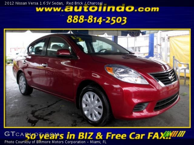 2012 Nissan Versa 1.6 SV Sedan in Red Brick