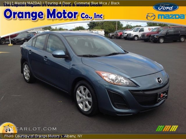 2011 Mazda MAZDA3 i Touring 4 Door in Gunmetal Blue Mica