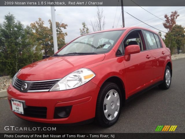 2009 Nissan Versa 1.8 S Hatchback in Red Alert