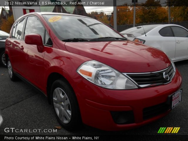 2012 Nissan Versa 1.8 S Hatchback in Red Alert