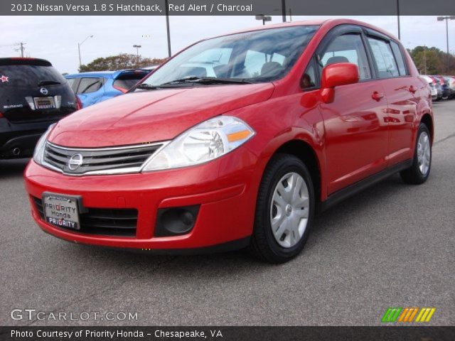 2012 Nissan Versa 1.8 S Hatchback in Red Alert