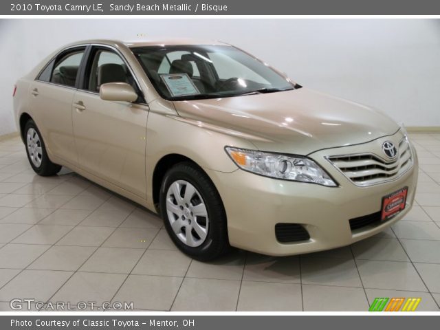 2010 Toyota Camry LE in Sandy Beach Metallic