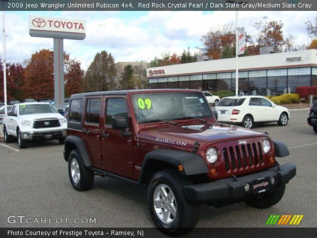 2009 Jeep Wrangler Unlimited Rubicon 4x4 in Red Rock Crystal Pearl