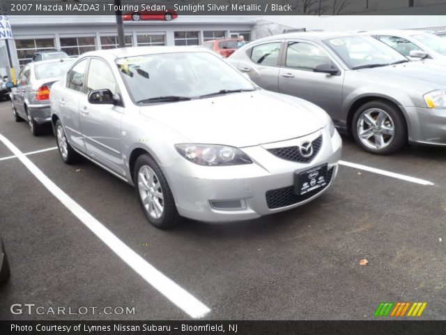 2007 Mazda MAZDA3 i Touring Sedan in Sunlight Silver Metallic