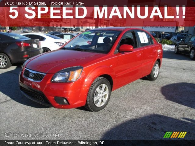 2010 Kia Rio LX Sedan in Tropical Red