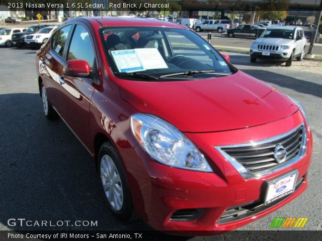 2013 Nissan Versa 1.6 SL Sedan in Red Brick