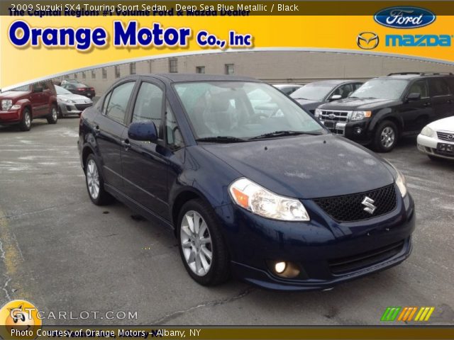 2009 Suzuki SX4 Touring Sport Sedan in Deep Sea Blue Metallic