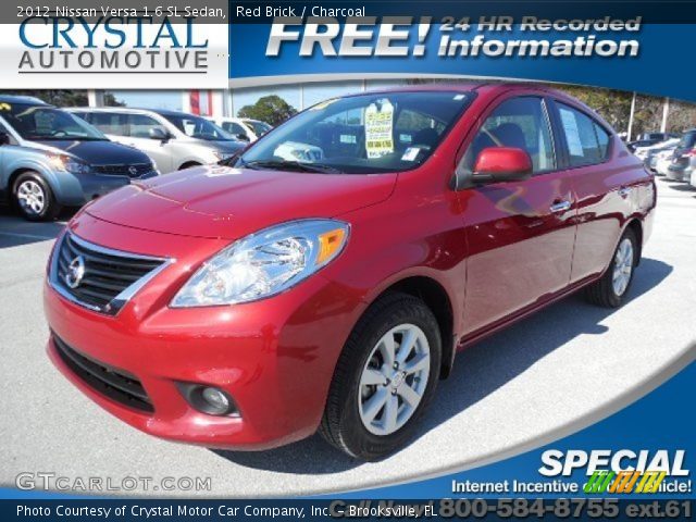 2012 Nissan Versa 1.6 SL Sedan in Red Brick