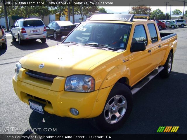 2002 Nissan Frontier SC Crew Cab 4x4 in Solar Yellow