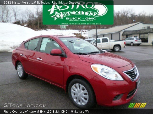 2012 Nissan Versa 1.6 SL Sedan in Red Brick