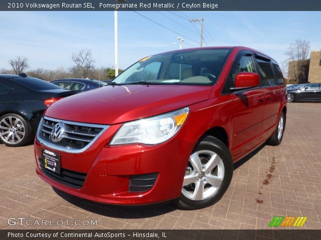 2010 Volkswagen Routan SEL in Pomegranate Red Metallic