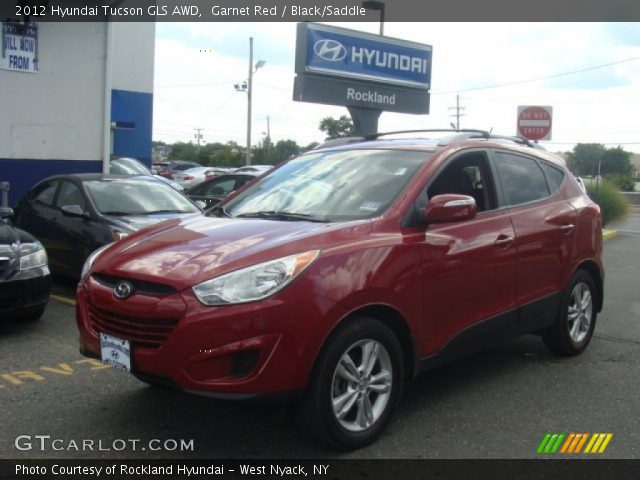 2012 Hyundai Tucson GLS AWD in Garnet Red
