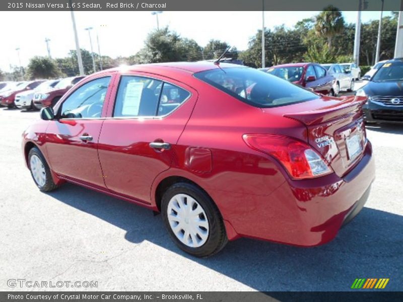 Red Brick / Charcoal 2015 Nissan Versa 1.6 S Sedan